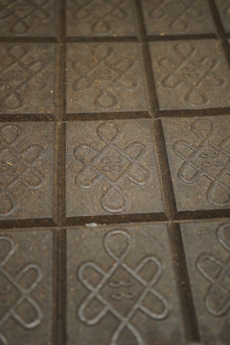 An Imperial Russian tea brick, made in China, 24 x 19cm